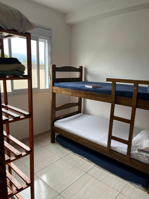 Postel nebo postele na pokoji v ubytování Espaço aconchegante e familiar