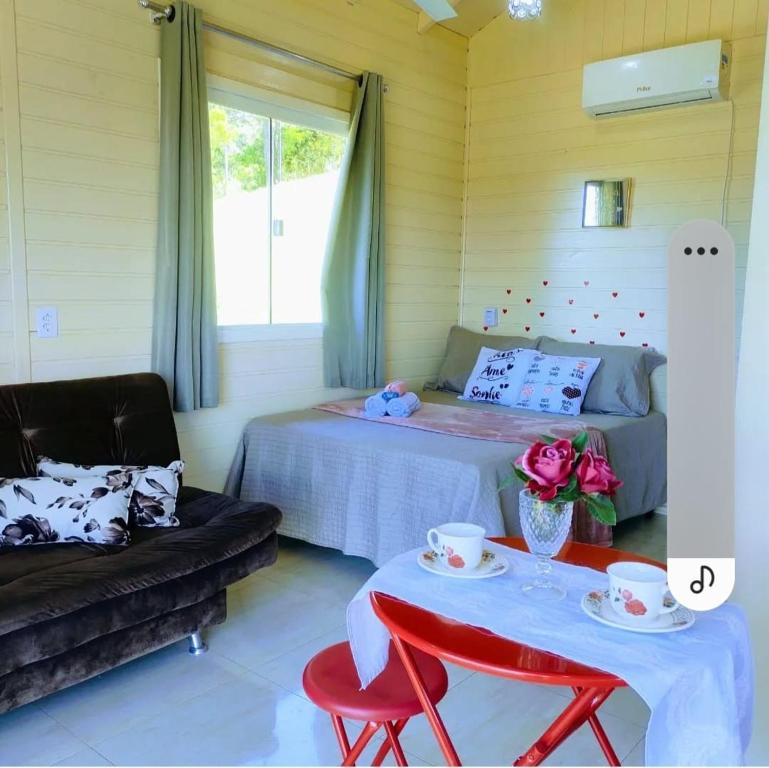 Katil atau katil-katil dalam bilik di Sitio Berebello cabana padrão