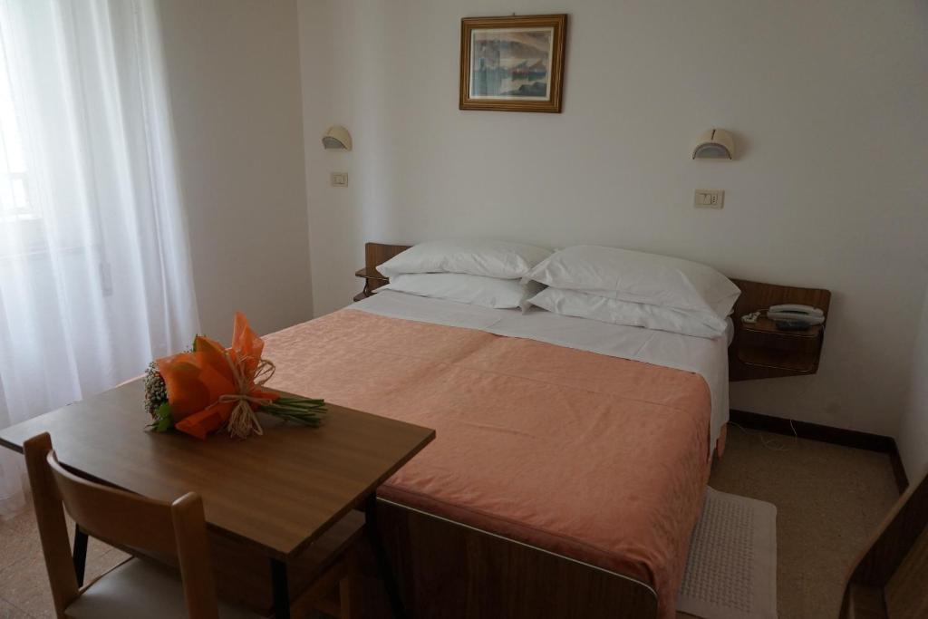 Postel nebo postele na pokoji v ubytování Hotel Aurora