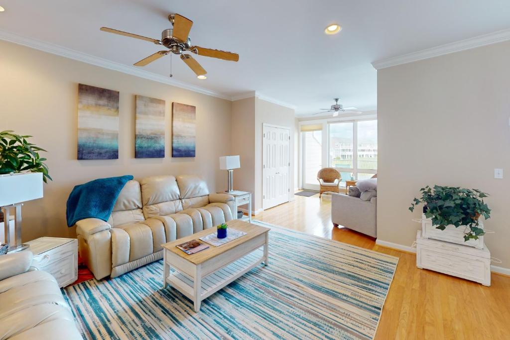 a living room with a couch and a table at Bayville Shores --- 38331 Ocean Vista Dr #1162 in Selbyville