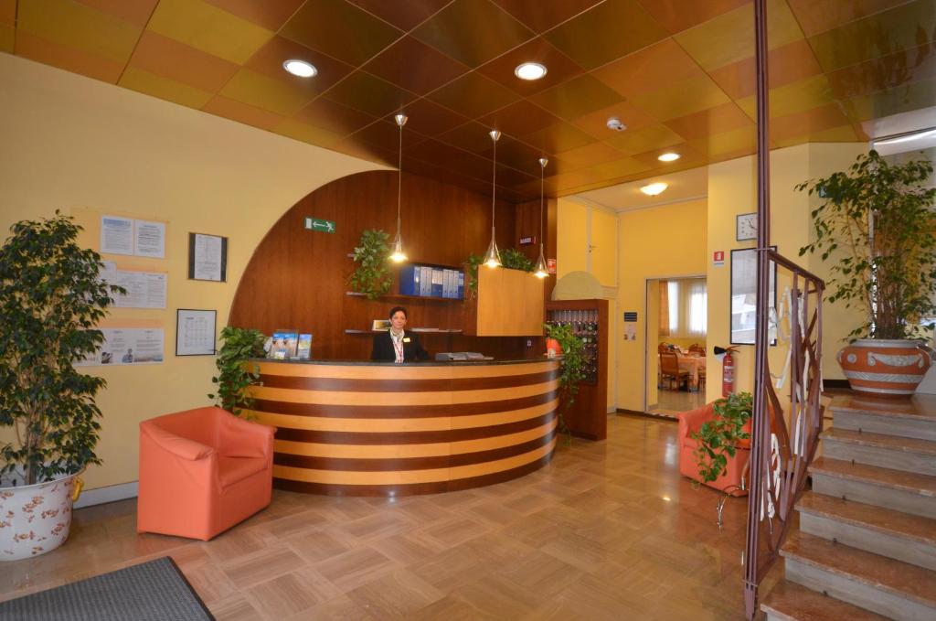 TV a/nebo společenská místnost v ubytování Aparthotel Pineda