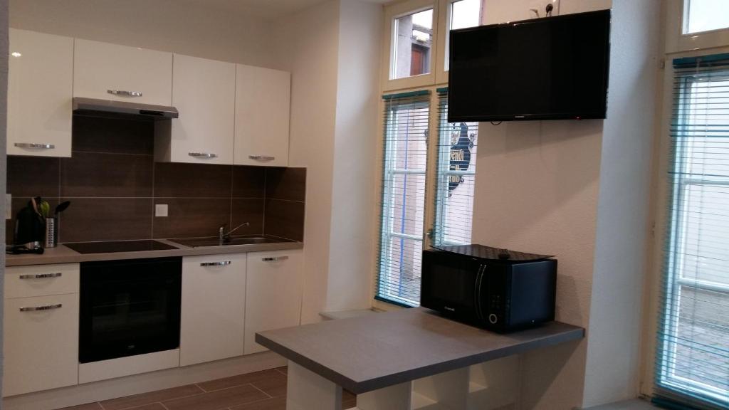 Una cocina o zona de cocina en Tripiers Duplex