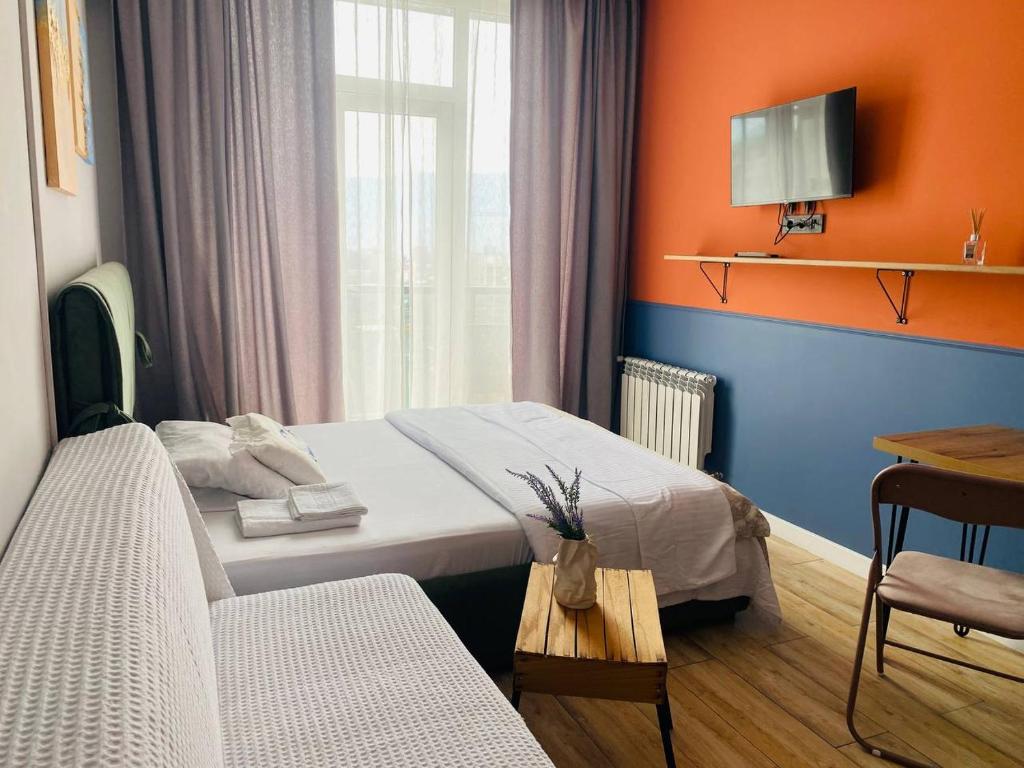 Ένα ή περισσότερα κρεβάτια σε δωμάτιο στο Апартаменты напротив моря в доме бизнес класса Guru residence