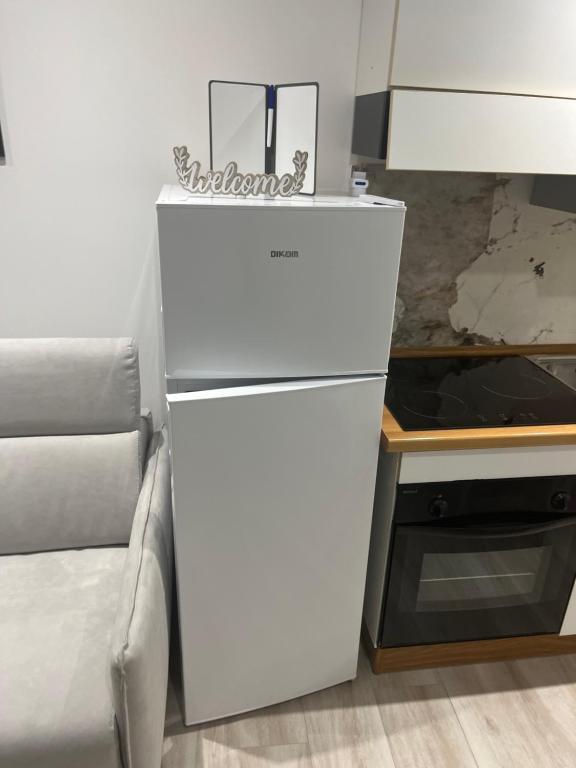 Kuchyň nebo kuchyňský kout v ubytování South Blue Apartment