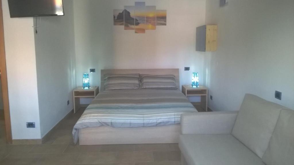 Postel nebo postele na pokoji v ubytování Villa Federico