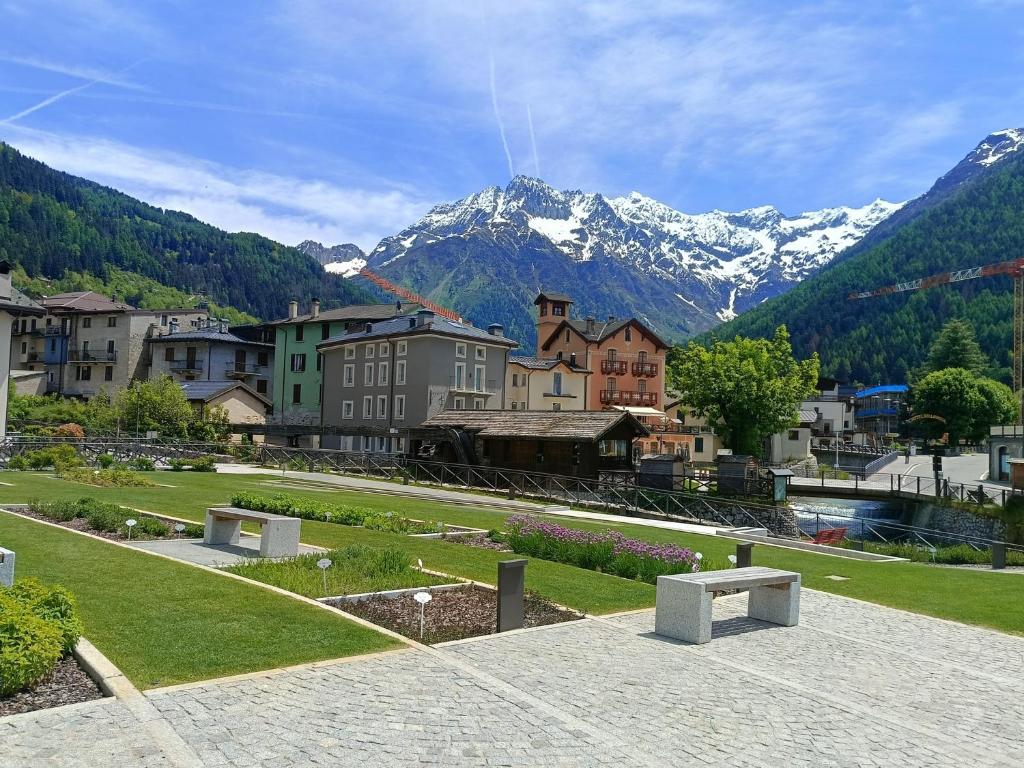 a view of a town with mountains in the background at Natali Home by Holiday World in Ponte di Legno