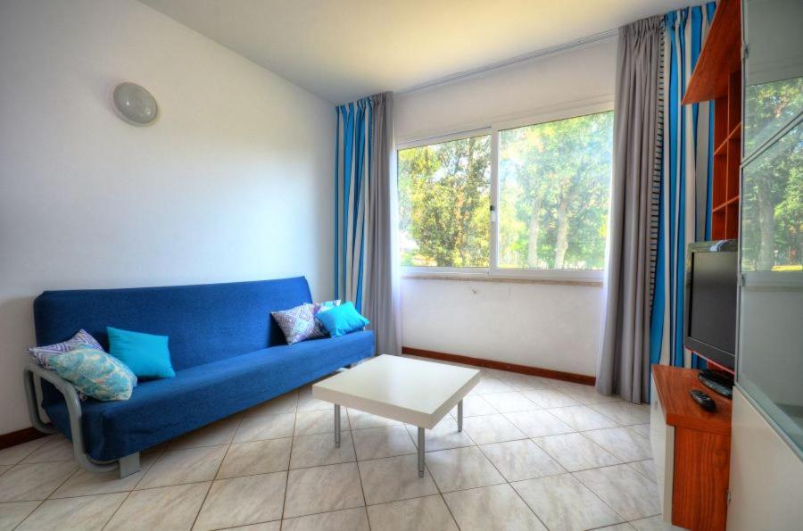 Ein Sitzbereich in der Unterkunft Verudela Villas