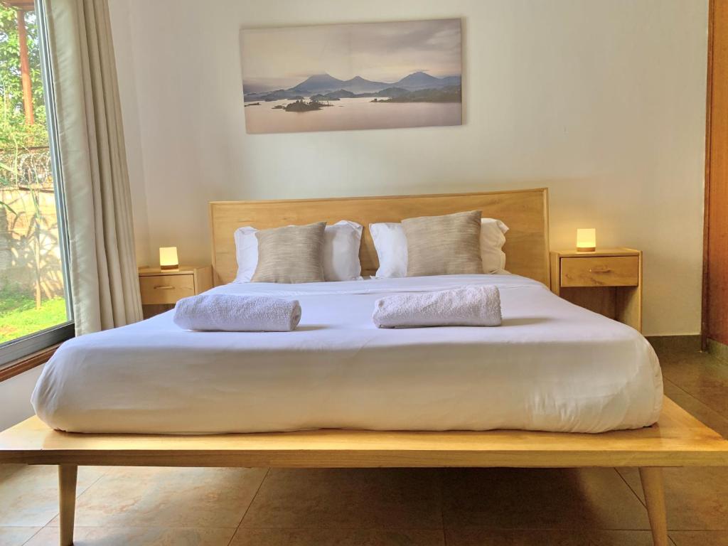 Krevet ili kreveti u jedinici u okviru objekta WanderHome 3BDR House