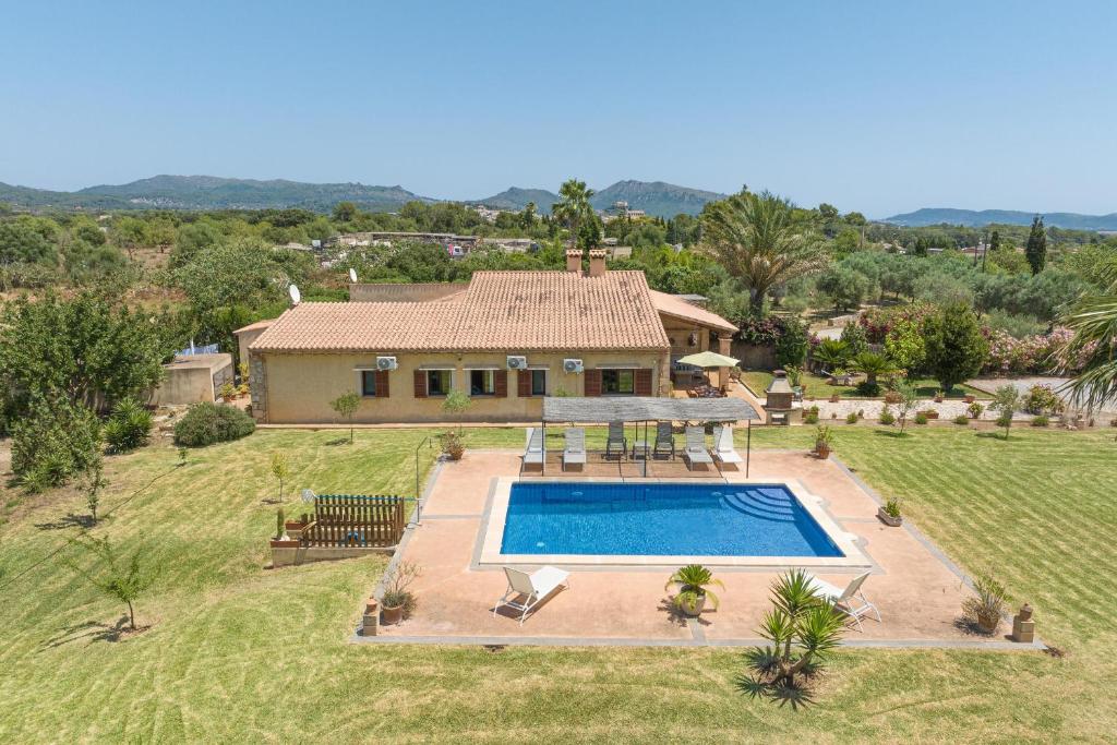 an aerial view of a house with a swimming pool at Finca Kelly in Artá