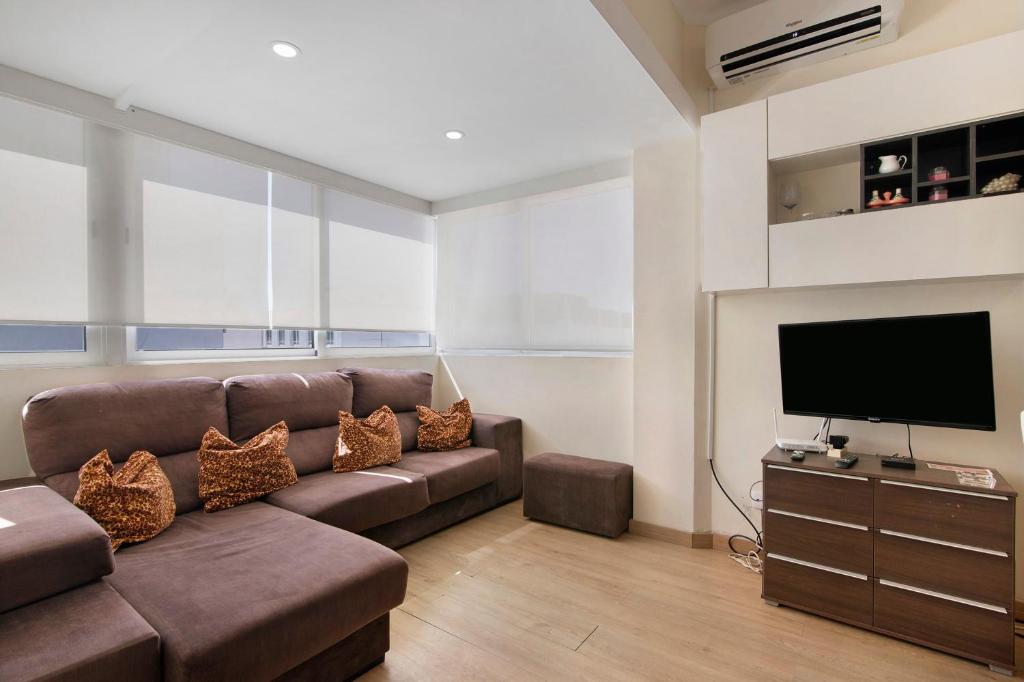 Μια τηλεόραση ή/και κέντρο ψυχαγωγίας στο Faro Downtown Suites - Ria Formosa