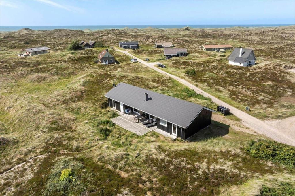 an overhead view of a house in a field at 899-Snedsted-Somaerkevej-76-B in Snedsted