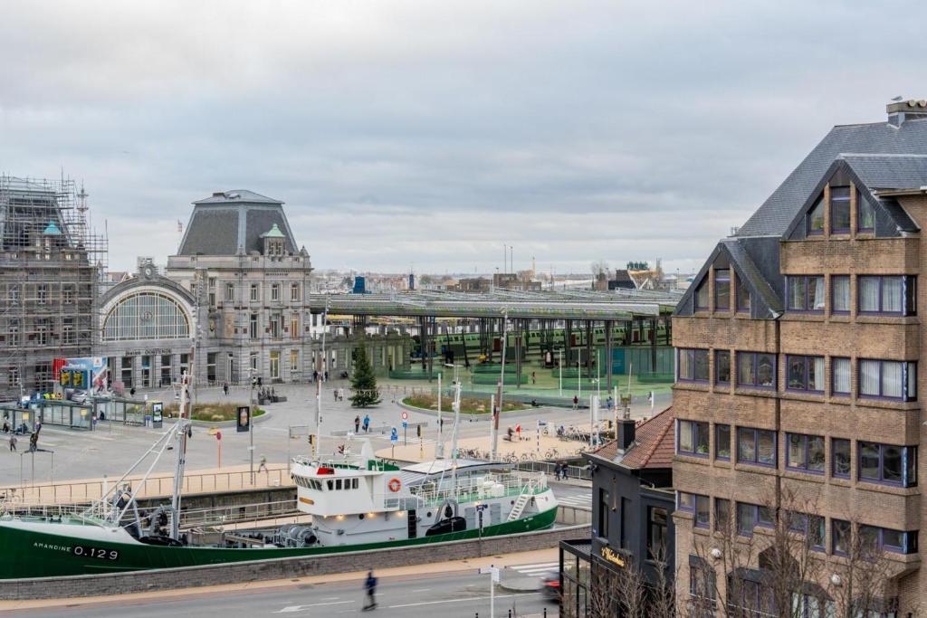 Nespecifikovaný výhled na destinaci Ostende nebo výhled na město při pohledu z prázdninového domu