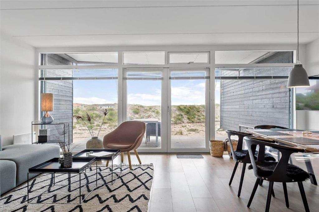 a living room with a couch and a table at 784-Thisted-Havstokken-30-A in Thisted