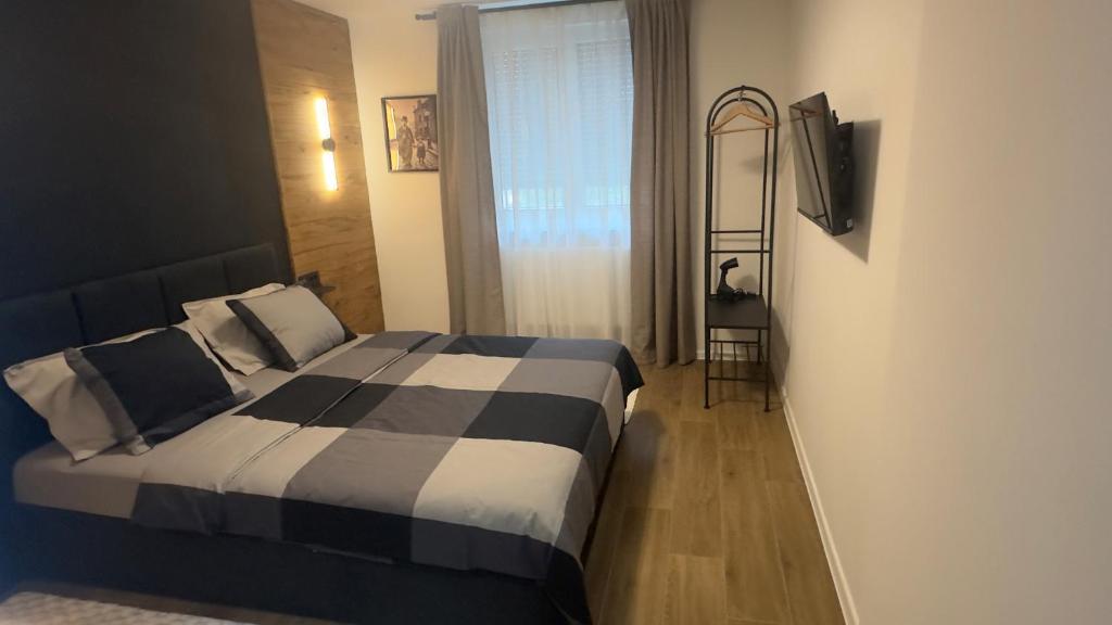 Postel nebo postele na pokoji v ubytování Apartman KOCKICA Entry with PIN 0-24h , Free parking