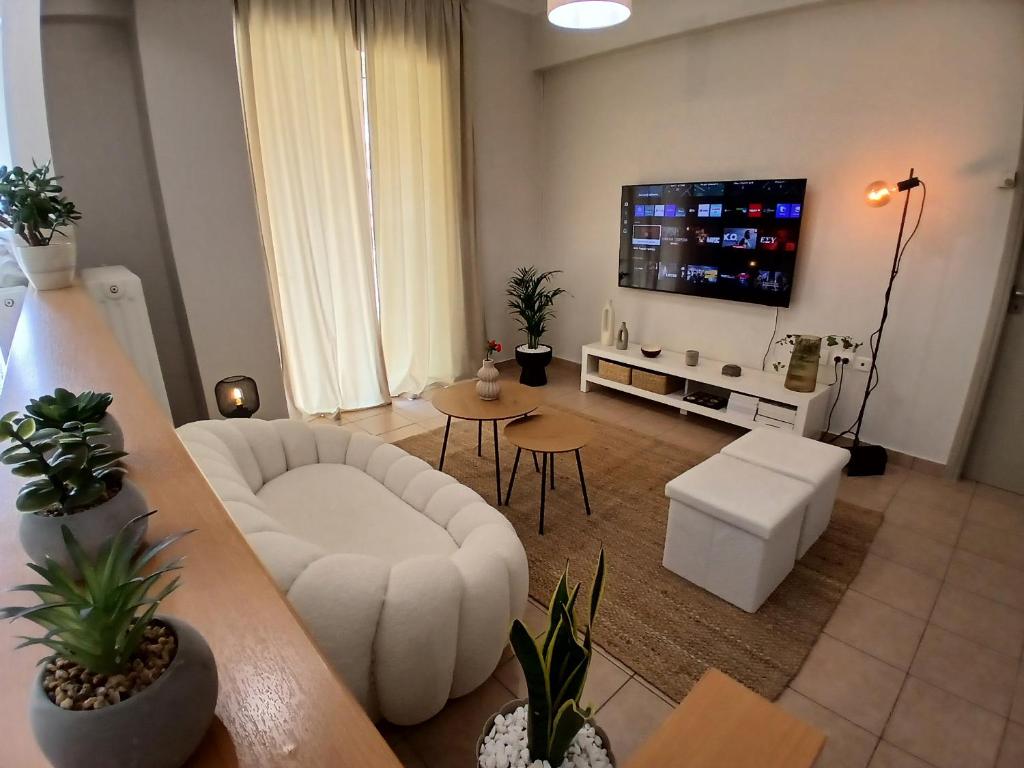 Μια τηλεόραση ή/και κέντρο ψυχαγωγίας στο Simplicity Luxury Living