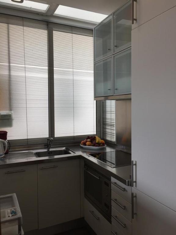Kuchyňa alebo kuchynka v ubytovaní Boulevard Apartmento