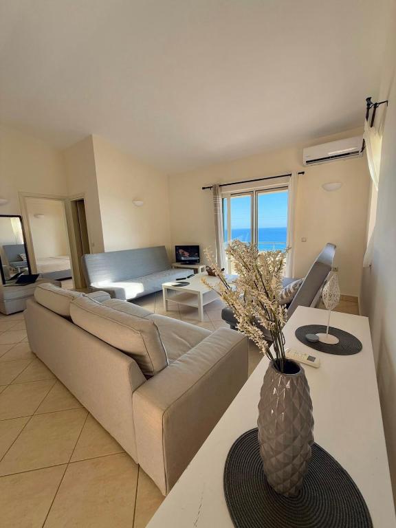 Ένα ή περισσότερα κρεβάτια σε δωμάτιο στο Lumiere Glyfada 3