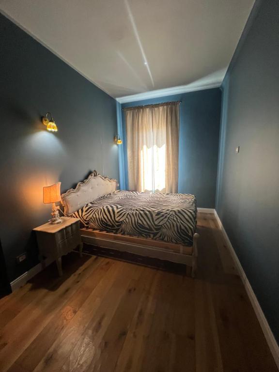 Postel nebo postele na pokoji v ubytování Residenza FedericoII
