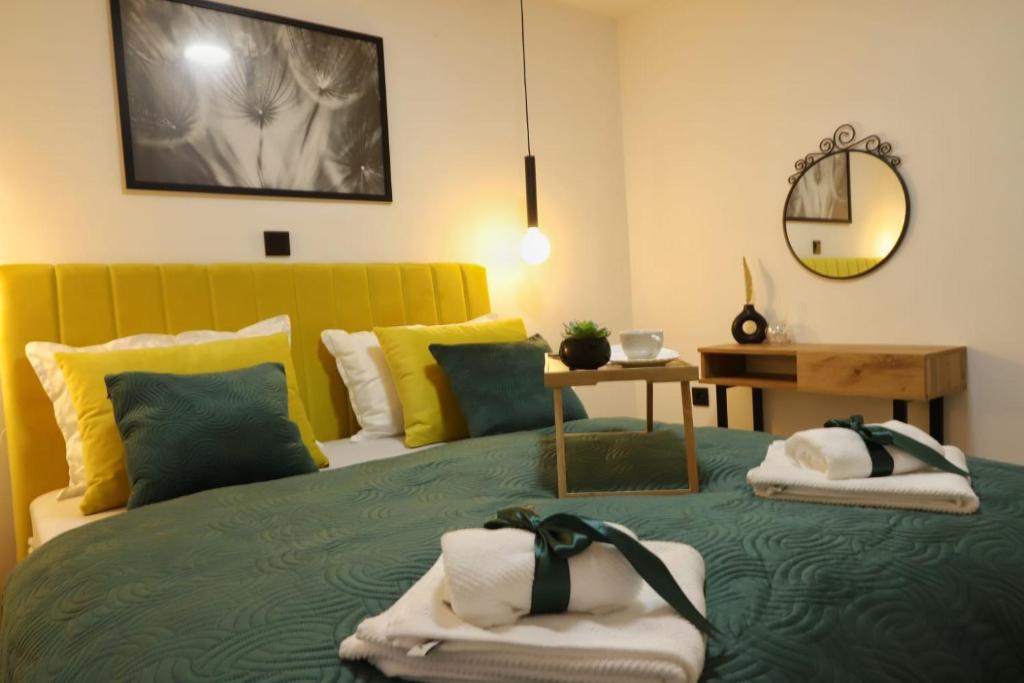 Ένα ή περισσότερα κρεβάτια σε δωμάτιο στο Apartman Eva