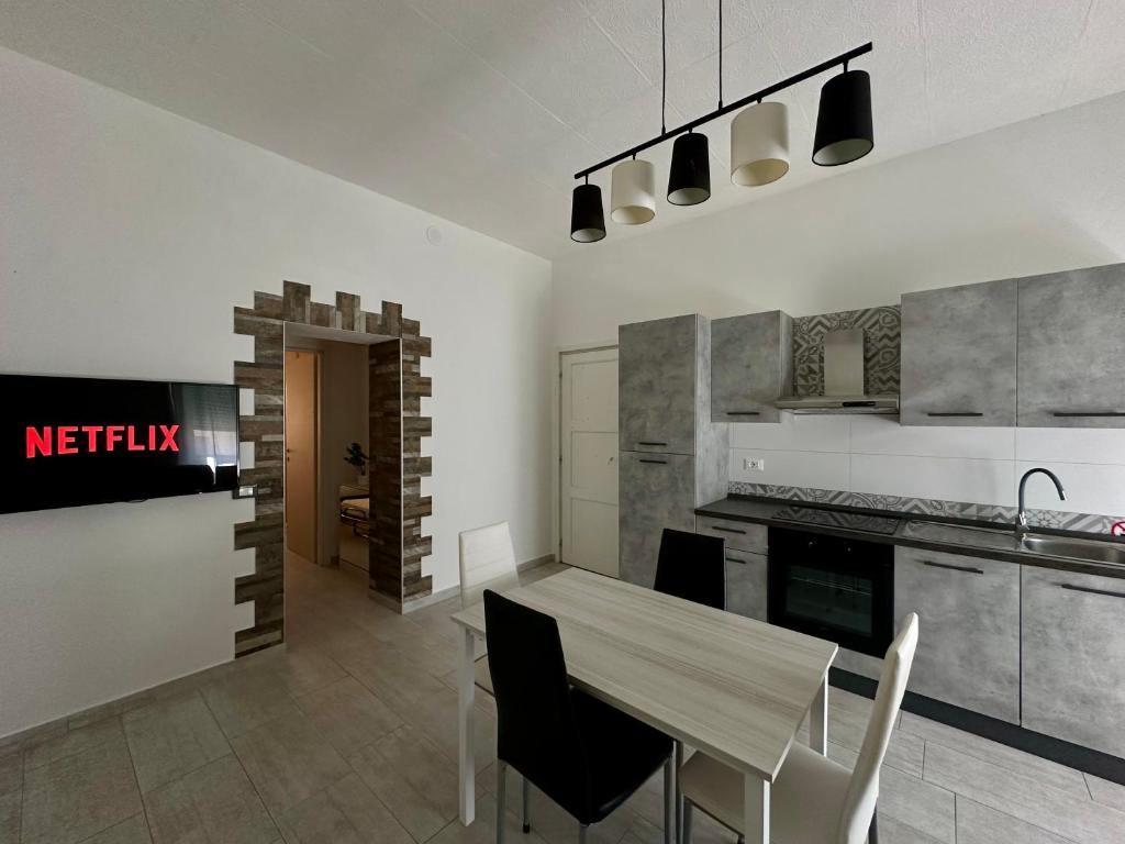 Η κουζίνα ή μικρή κουζίνα στο Olbia Terranova - Apartments