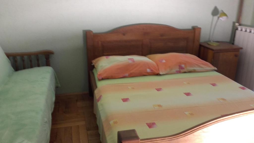A bed or beds in a room at Villa Mateja