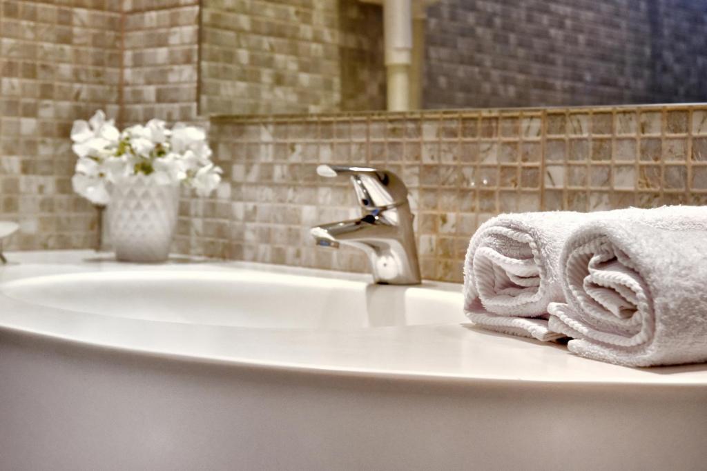 Salle de bains dans l'établissement Hotel Korali