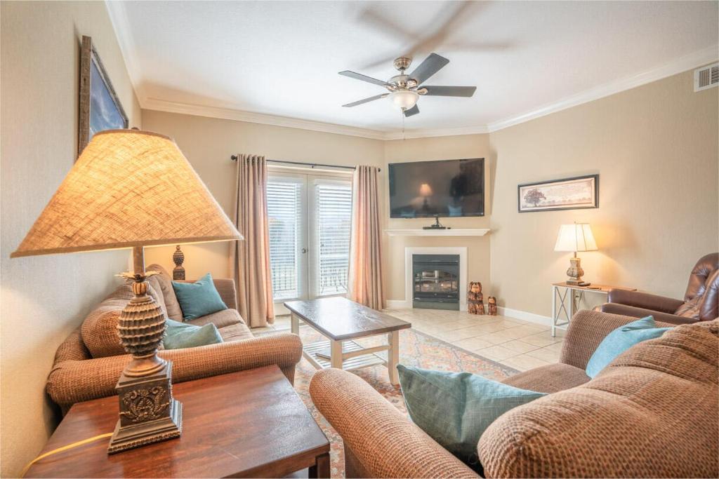 a living room with a couch and a table at Mountain View Condo 3307 in Pigeon Forge