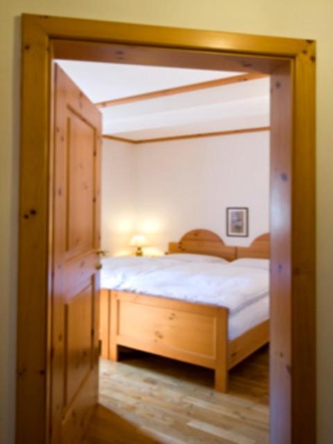 Postel nebo postele na pokoji v ubytování Residence Kampidell
