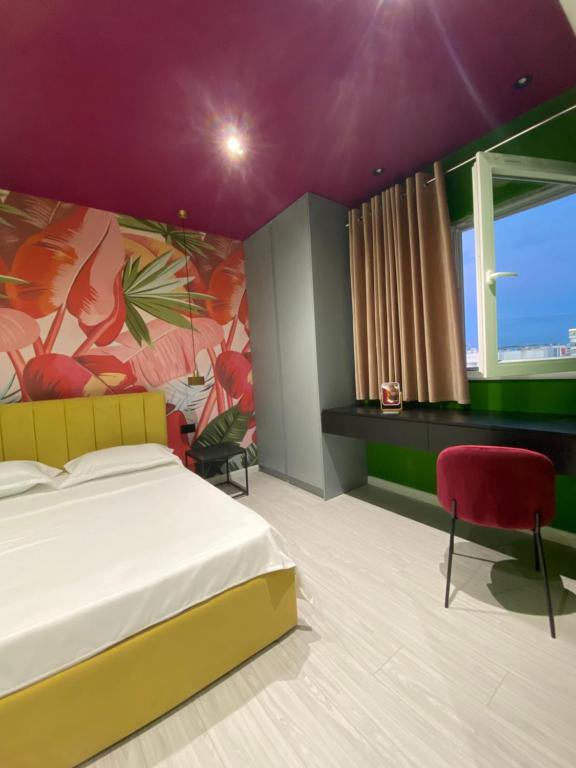 Voodi või voodid majutusasutuse Funky Breeze by the Sea toas