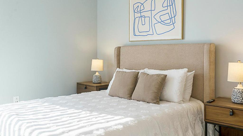 Ένα ή περισσότερα κρεβάτια σε δωμάτιο στο Canal Walk District Apartments by Landing