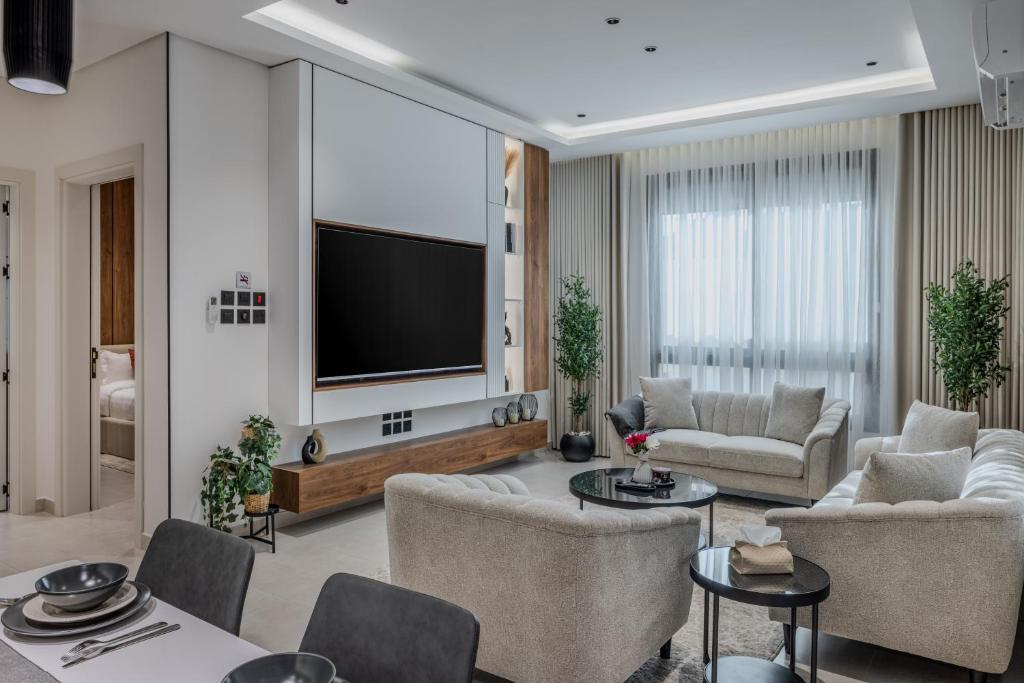 Χώρος καθιστικού στο Yasmin Homes - Luxury Apartments