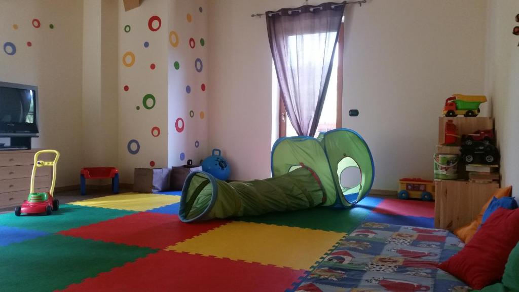 TV a/nebo společenská místnost v ubytování Albergo Chalet Abete Rosso
