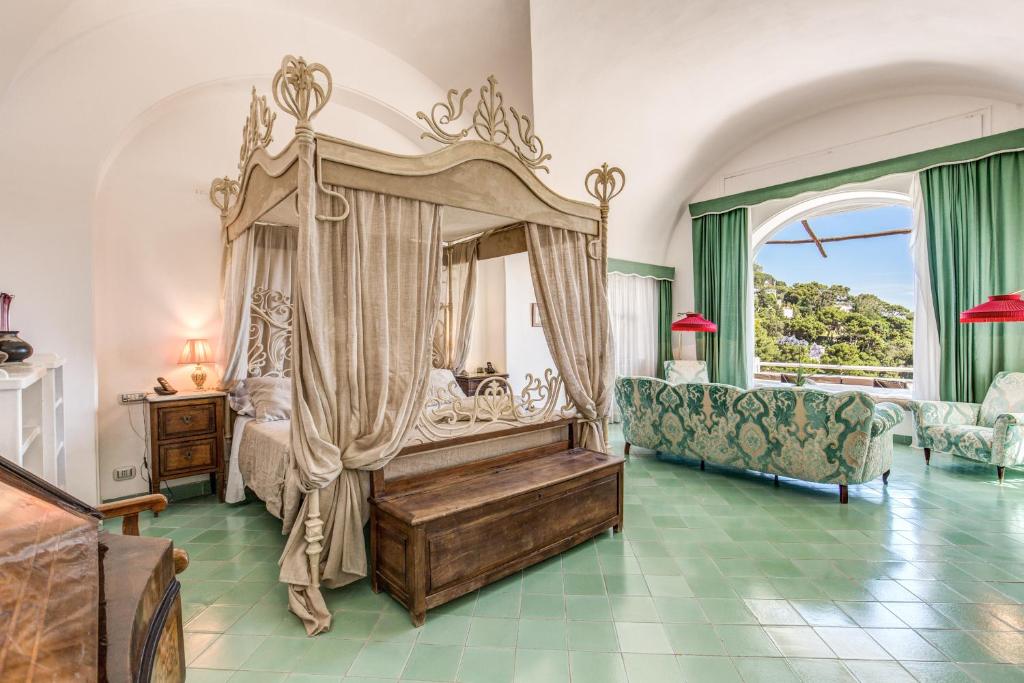 Una cama o camas en una habitación de Villa Calypso
