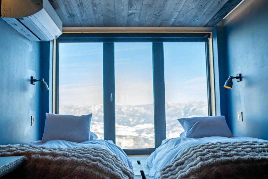 Unkai Lodge - Deluxe Doppel- Oder Zweibettzimmer Mit Bergblick