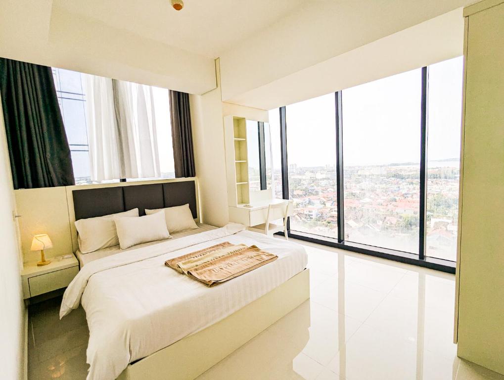 Ένα ή περισσότερα κρεβάτια σε δωμάτιο στο Lovina 12-01 at Pollux Habbie