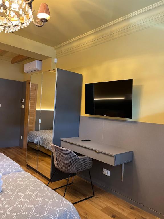 TV a/nebo společenská místnost v ubytování Gościniec