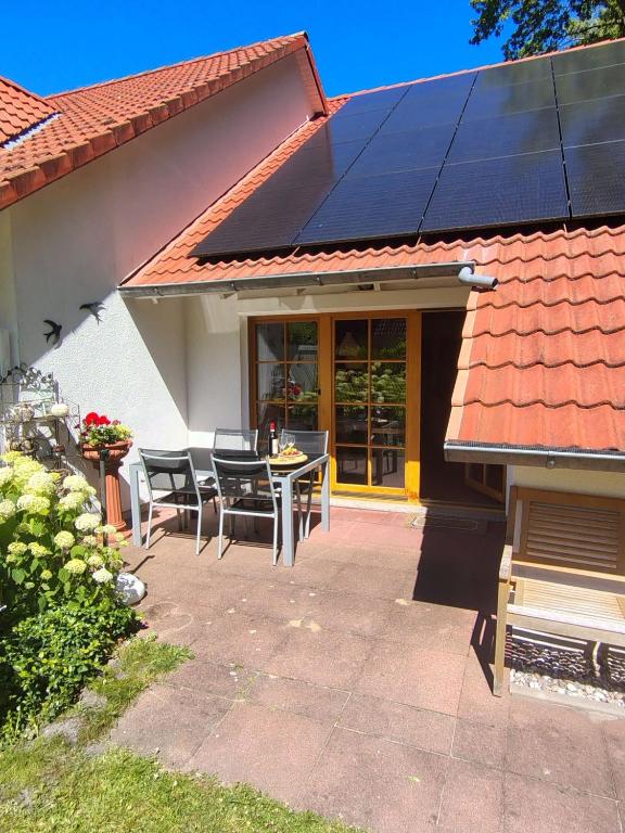 a solar panel on the roof of a house at Schwalbenweg in Zingst
