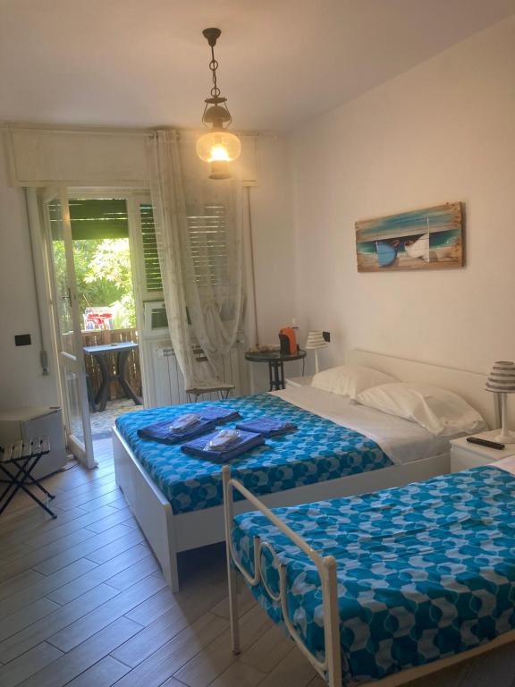 Ένα ή περισσότερα κρεβάτια σε δωμάτιο στο GUEST HOUSE BERZEFI