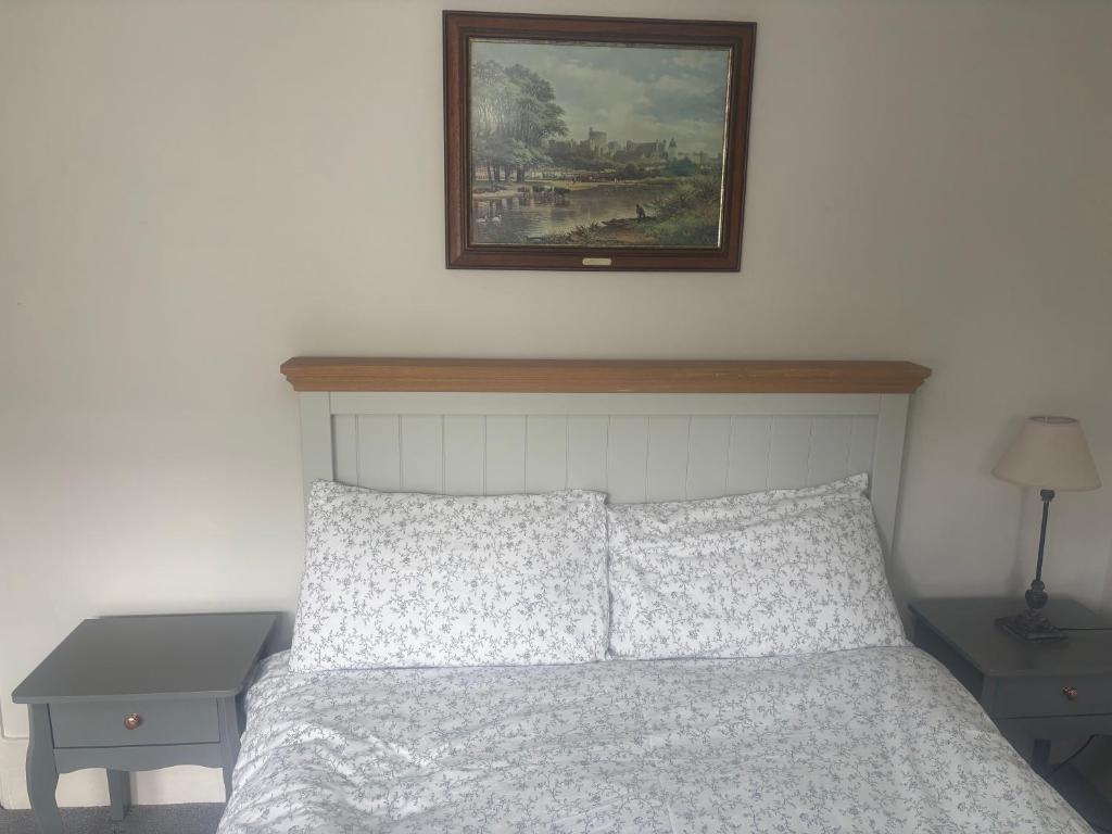 Postel nebo postele na pokoji v ubytování The Windsor Room