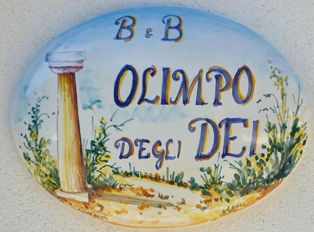 Un certificat, premiu, logo sau alt document afișat la Olimpo degli Dei