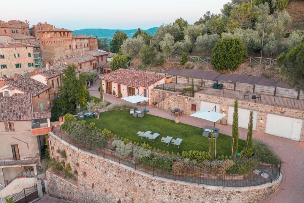 an aerial view of a medieval town with a garden at Boutique Hotel Masolino in Panicale