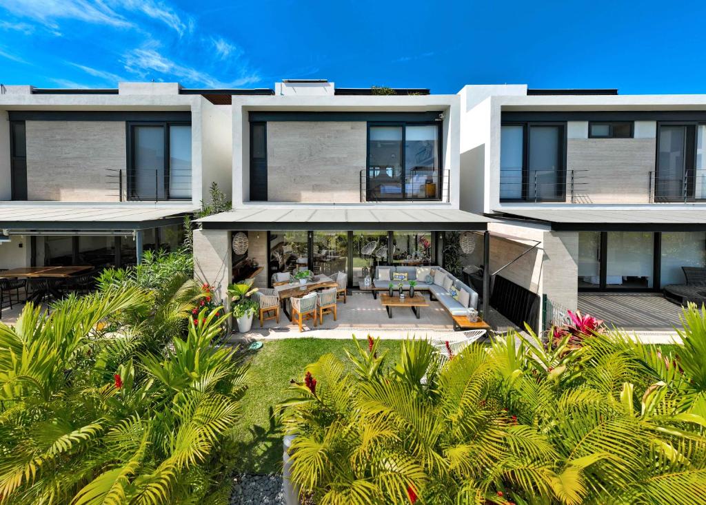 an aerial view of a house with palm trees at Vista Natura in Nuevo Vallarta