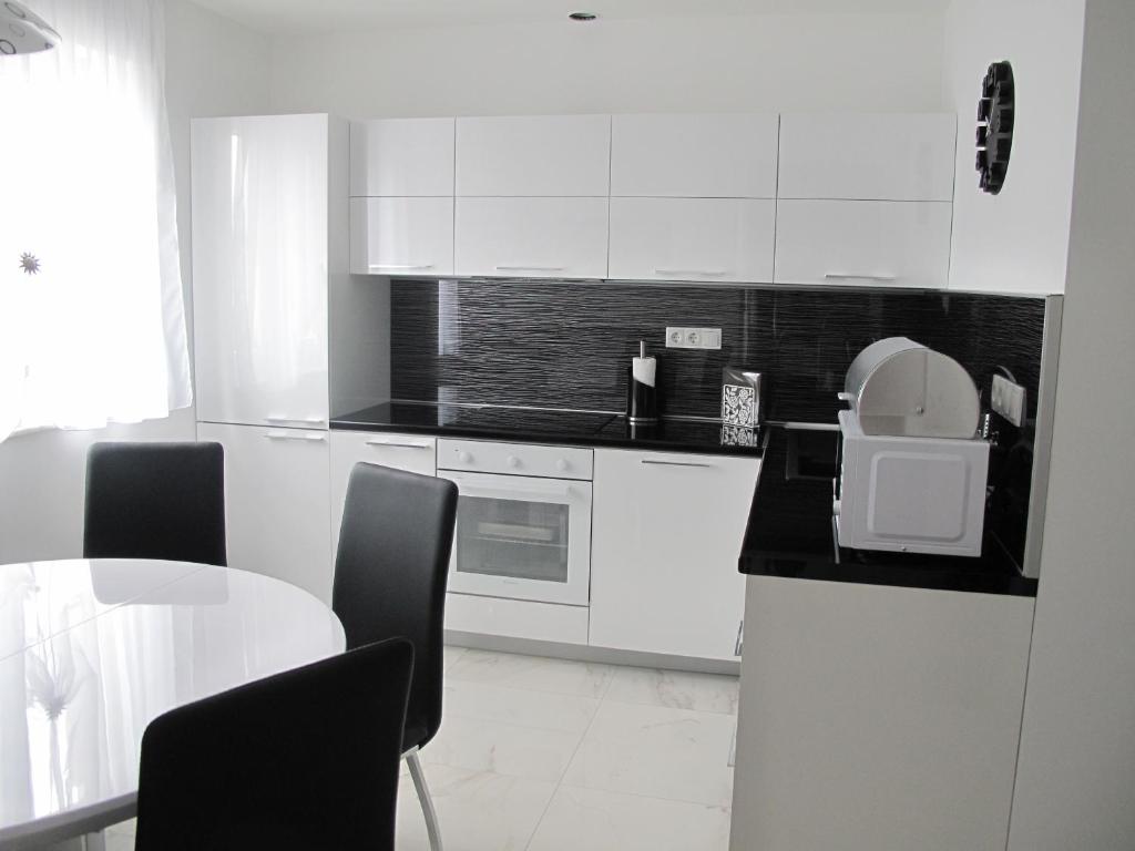 Kuchyň nebo kuchyňský kout v ubytování Apartments Mia Krk