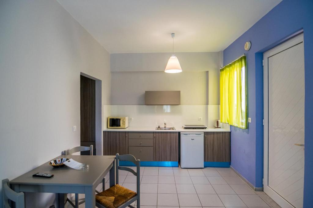Kuchyň nebo kuchyňský kout v ubytování Evelin Hotel