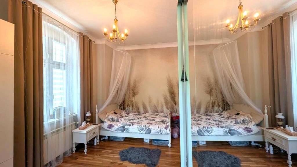 Ένα ή περισσότερα κρεβάτια σε δωμάτιο στο Vintage Apartment vis-à-vis Park Tower