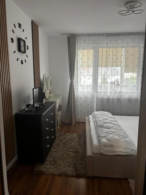 Postel nebo postele na pokoji v ubytování Sweet Stay Central