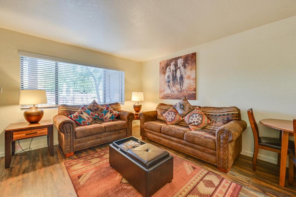 a living room with two couches and a table at The Painted Pony Sedona Condo Pool and Gym Access in Sedona