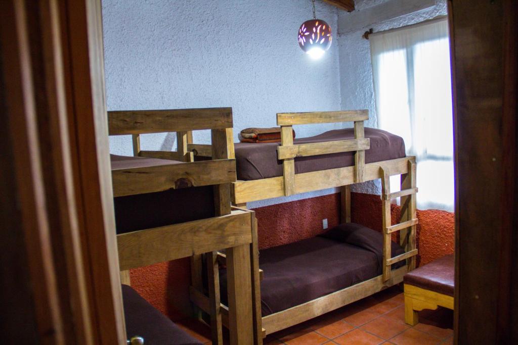 Postel nebo postele na pokoji v ubytování Cabañas RuizSeñor