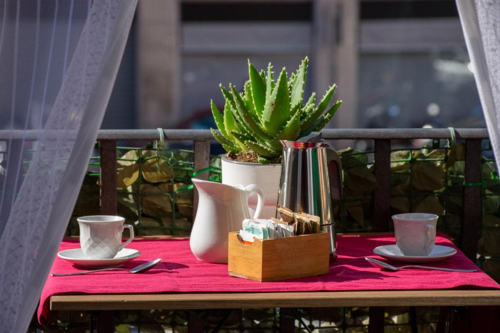 Příslušenství pro přípravu čaje a kávy v ubytování La casa di Bubi