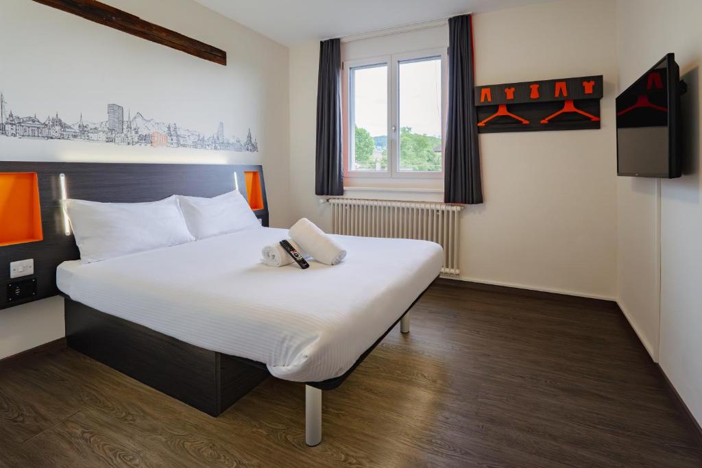Katil atau katil-katil dalam bilik di easyHotel Zürich City West